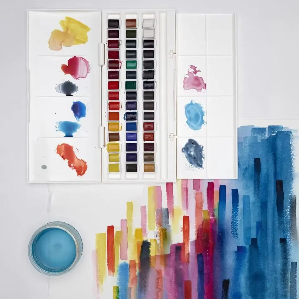 Grand coffret de peinture aquarelle. Plusieurs godets de peintures aquarelles. Peinture de la marque Winsor & Newton. Exprimez-vous avec confiance !