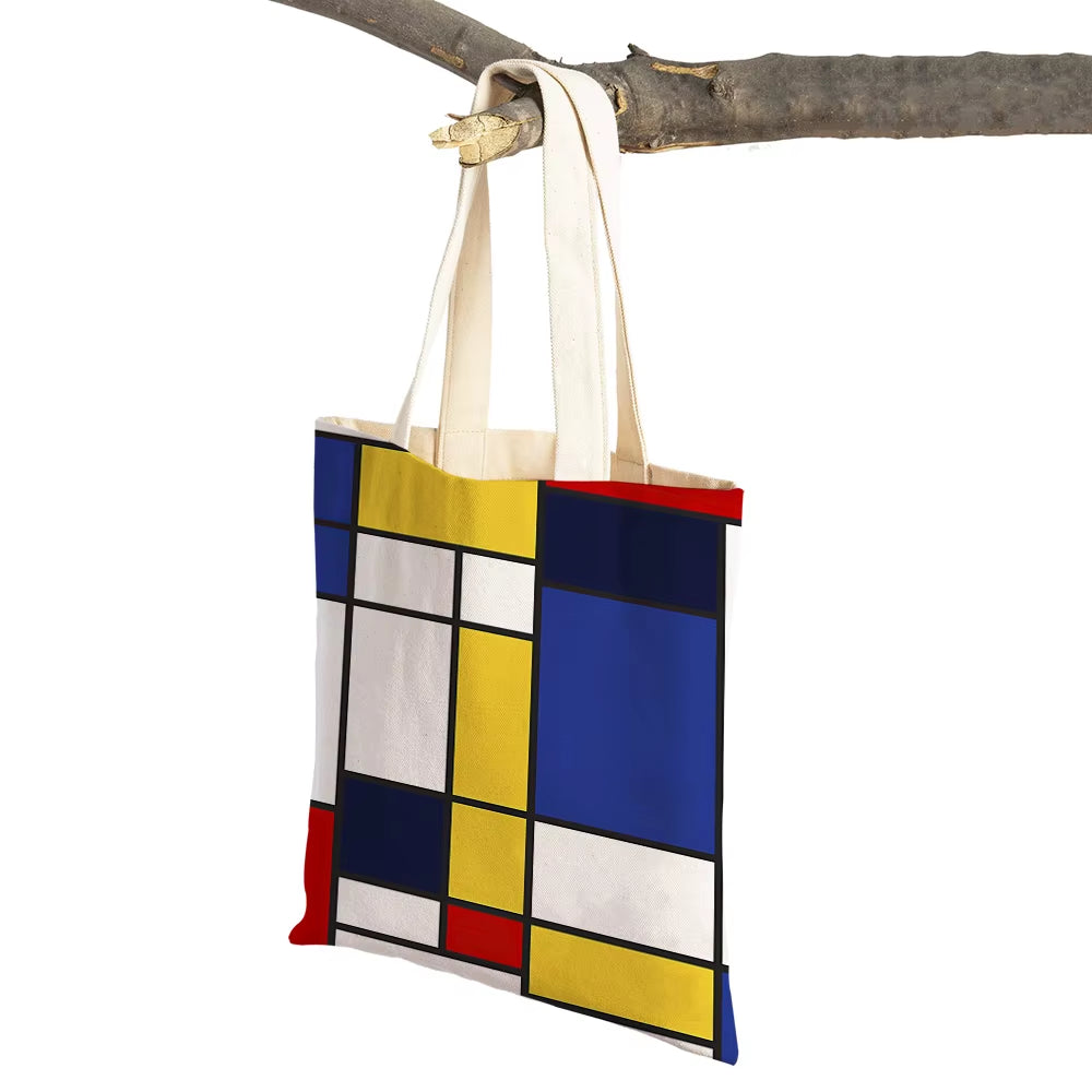 Sac icône d’art moderne : style graphique, moderne et fonctionnel. Objets de design historique Mondrian. L'accessoire design idéal pour votre quotidien.