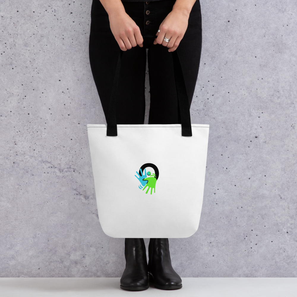 Sac Tote bag blanc avec logo centré, pratique et stylé. Il véhicule un message fort : valoriser la langue des signes aux côtés du français au quotidien.